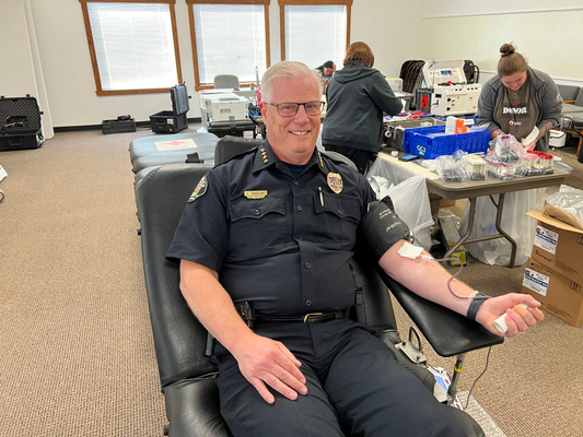 Fargo Police Chief David Zibolski gives blood during the Battle of the Badges Blood Drive in 2022.
