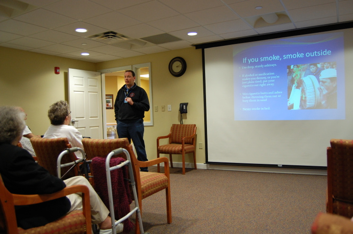 Captain Jesse Schmidt speaking at a retirement community